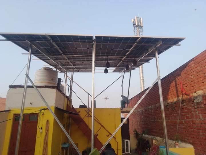 Solar elevated structure near yellow building