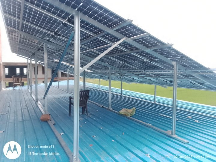 Night view of solar structure frame over blue roof