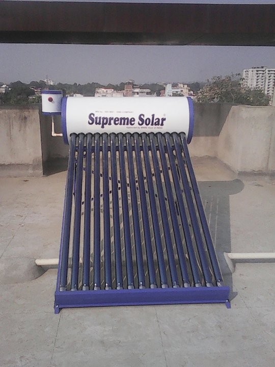 Solar structure over blue roof in daylight